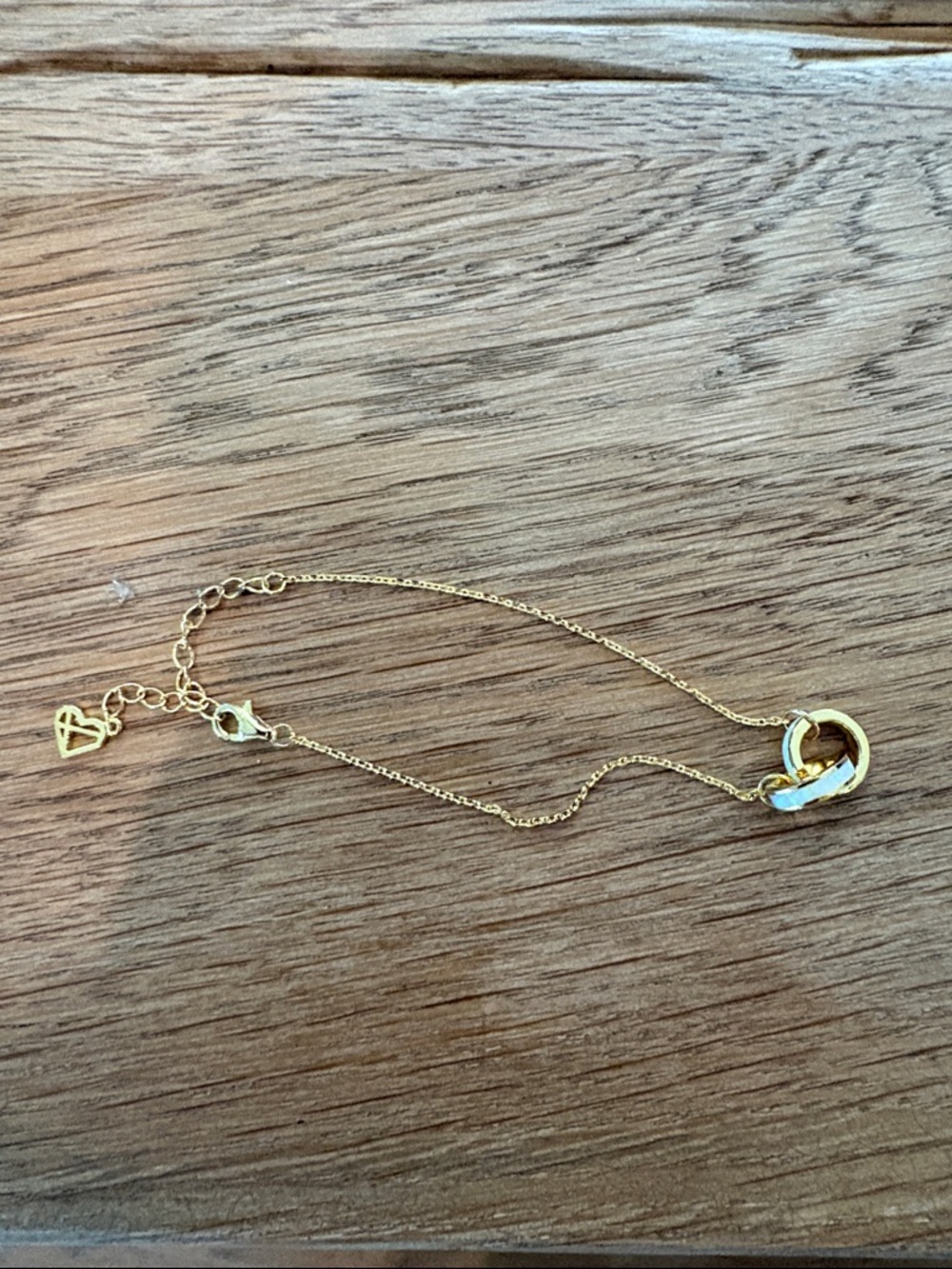 Delicate gold over brass Bracelet with Circular Charm